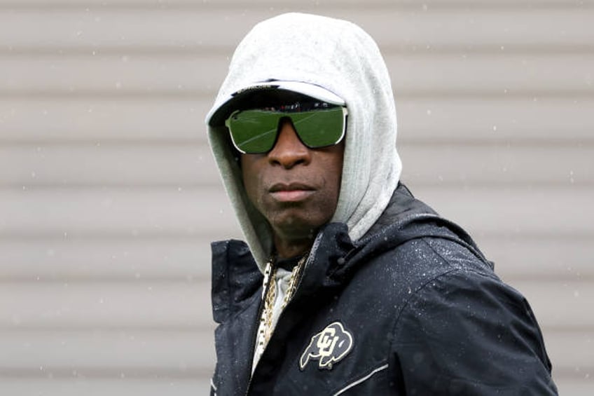 Head coach Deion Sanders of the Colorado Buffaloes watches as his team warms-up prior to their spring game at Folsom Field on April 27, 2024 in...