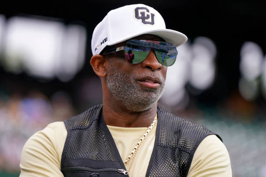 Former NFL player and Colorado Buffalos head coach Deion Sanders looks on prior to a game between the Arlington Renegades and Birmingham Stallions at...