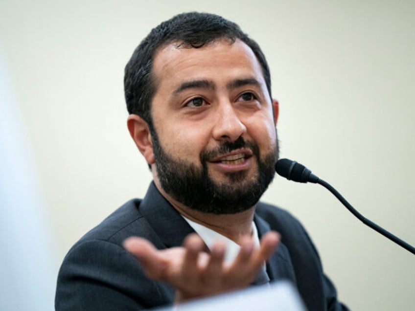 Executive Director of the Syrian Emergency Task Force Mouaz Moustafa speaks during a Commi