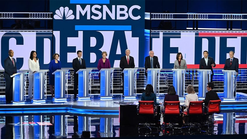 Candidates prepare to debate in the fifth Democratic primary debate of the 2020 presidential campaign season co-hosted by MSNBC and The Washington Post at Tyler Perry Studios in Atlanta, Georgia on Nov. 20, 2019.