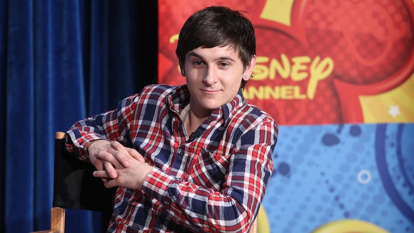 former disney star mitchel musso denies public intoxication theft charges after arrest