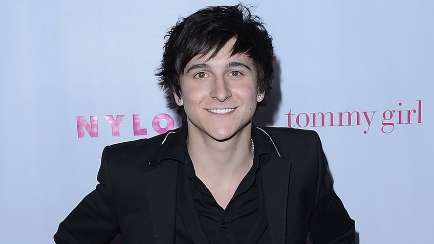 former disney star mitchel musso denies public intoxication theft charges after arrest