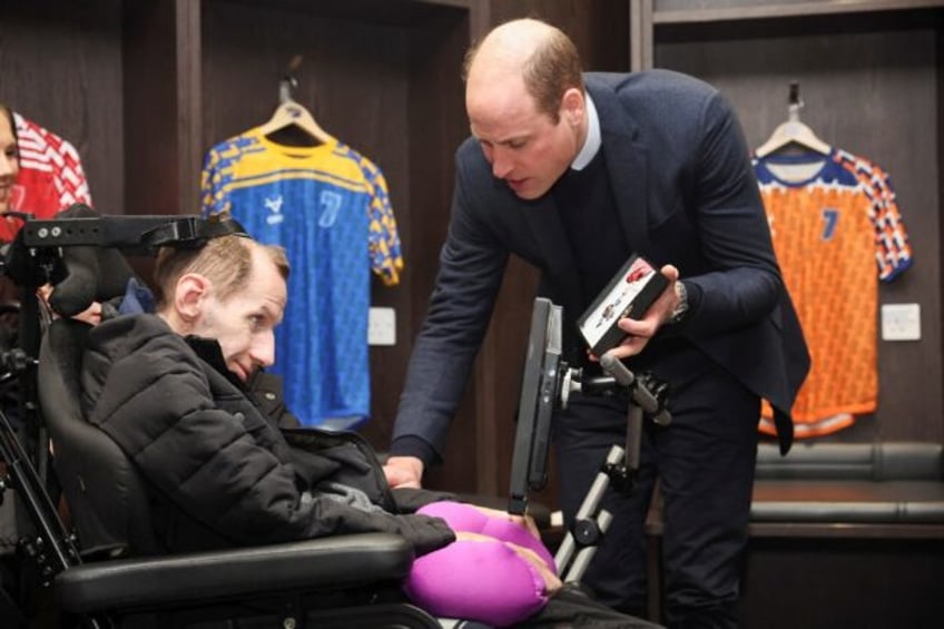 Prince William meets with Rob Burrow (L) at Headingley Stadium in 2024