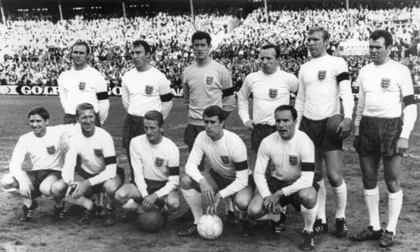 George Eastham (front row, 3rd from left) poses with the England team before a friendly ag