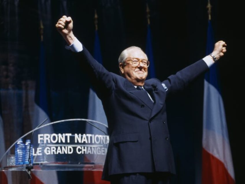 French far-right leader Marine Le Pen (R) and her father French former leader and founder