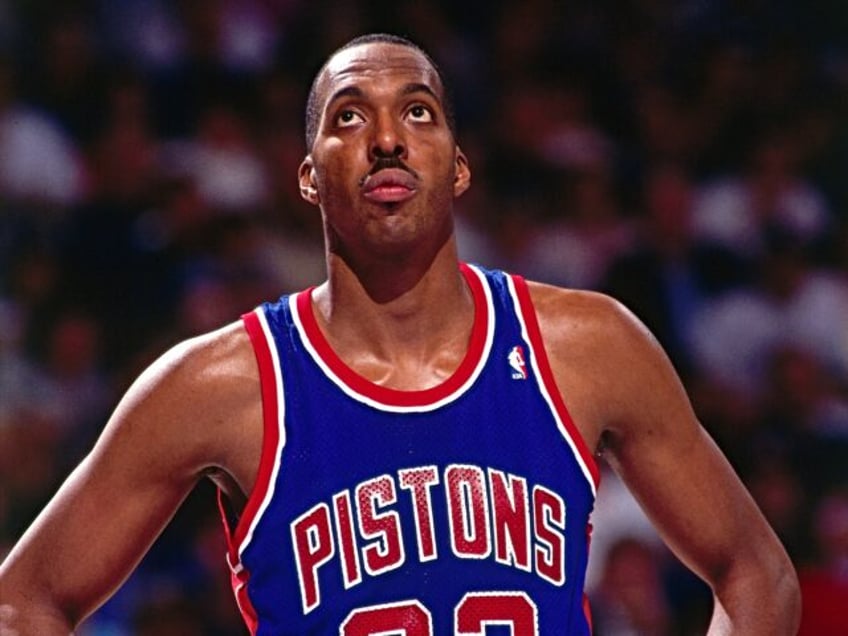 SACRAMENTO, CA - 1992: John Salley #22 of the Detroit Pistons looks up to the scoreboard during a game against the Sacramento Kings played on March 14, 1992 at Arco Arena in Sacramento, California. NOTE TO USER: User expressly acknowledges and agrees that, by downloading and or using this photograph, …