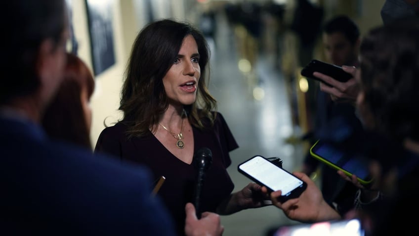 Mace speaks to reporters in Capitol hallway