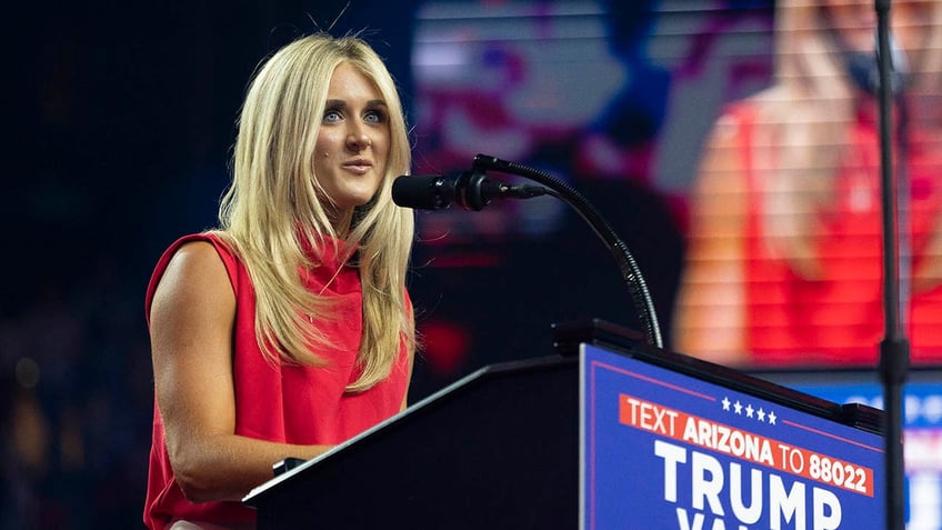 Former competitve swimmer Riley Gaines speaks during a campaign rally for Republican presidential nominee, former U.S. President Donald Trump at Desert Diamond Arena on August 23, 2024, in Glendale, Arizona. The rally, held in partnership with Turning Point PAC and Turning Point Action, came two weeks after Democratic presidential nominee U.S. Vice President Harris held a rally at the same location. 