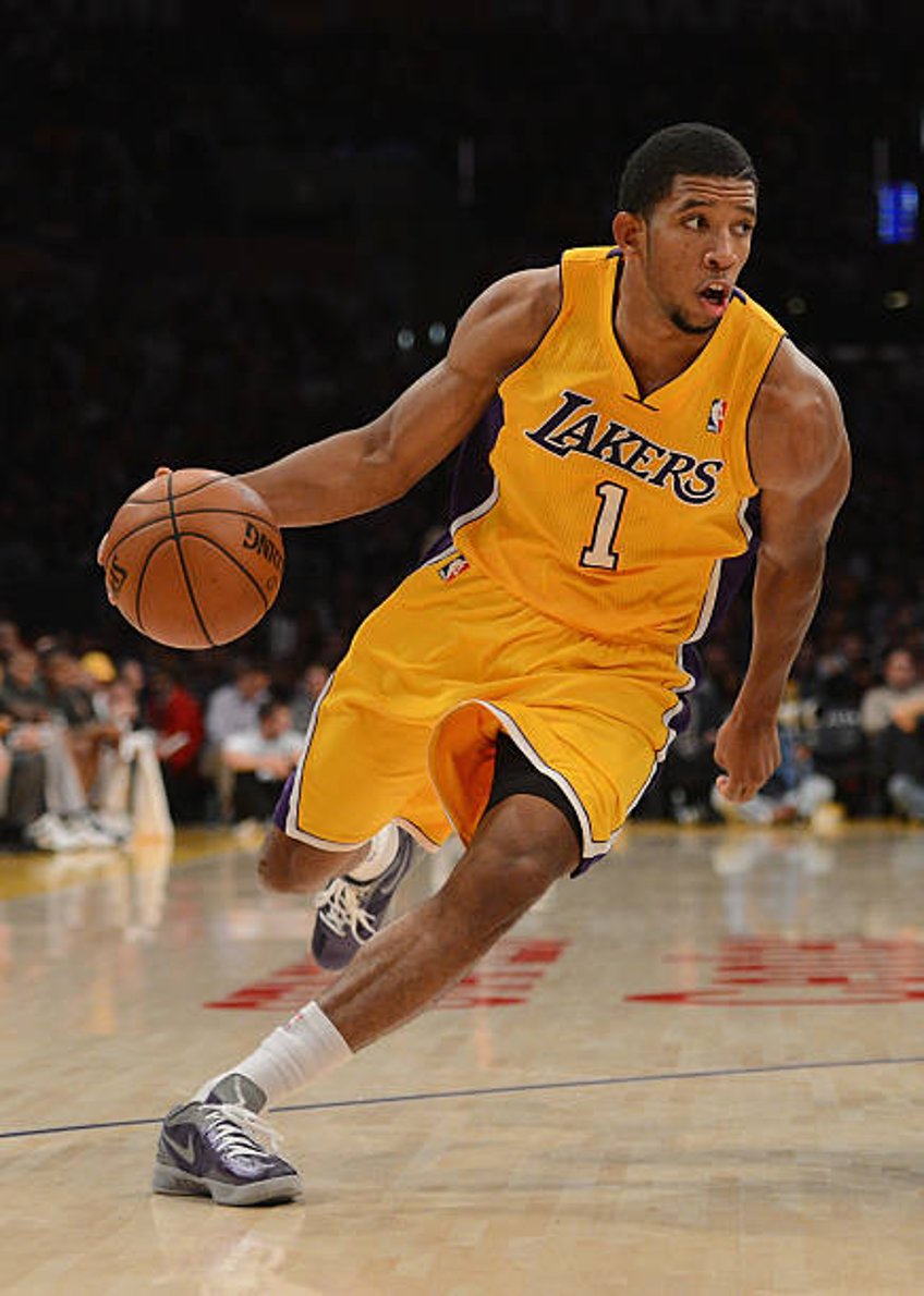 Darius Morris of the Los Angeles Lakers drives to the basket during the game against the San Antonio Spurs at Staples Center on November 13, 2012 in...