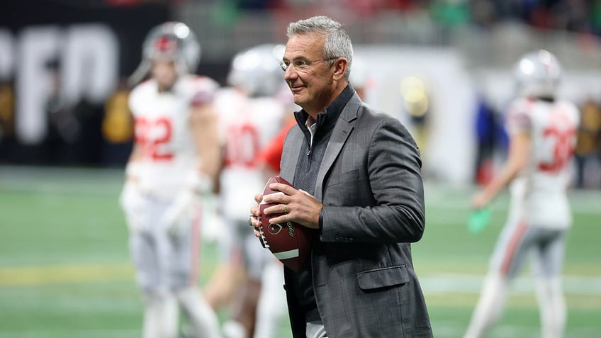 Urban Meyer looks on during an Ohio State game