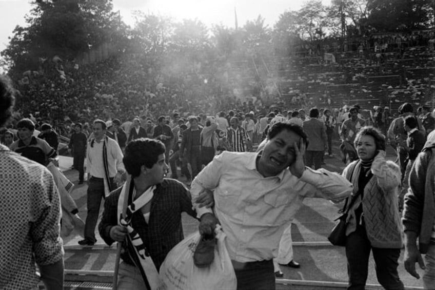 Thirty-nine football supporters died and some 600 were injured after a wall collapsed at t