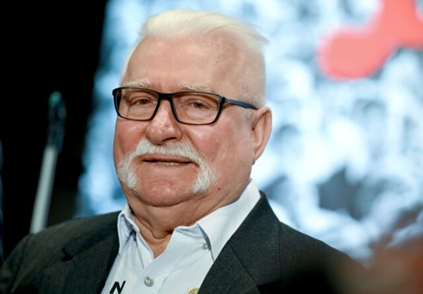 former polish president lech walesa 80 says he is better but remains hospitalized with covid 19