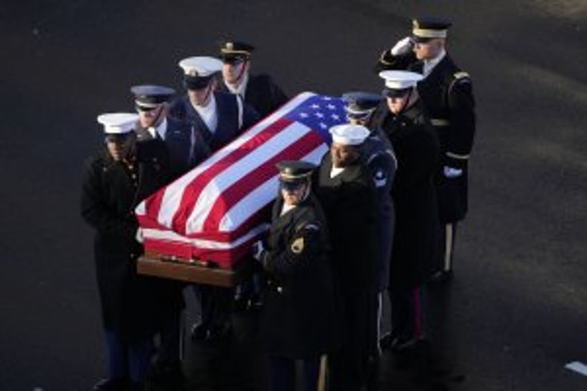 Former President Jimmy Carter arrives in Washington, D.C., for 3-day state funeral