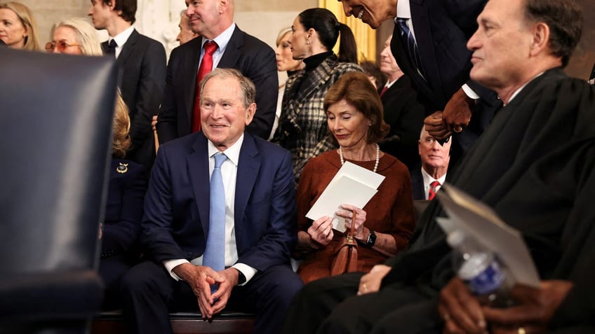 George and Laura Bush and Barack Obama