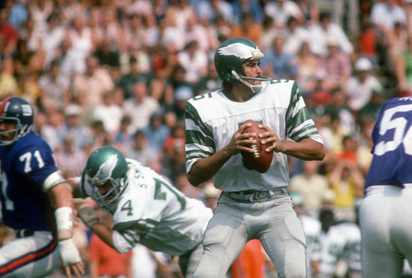 Roman Gabriel of the Philadelphia Eagles drops back to pass against the New York Giants during an NFL football game December 8, 1974 at the Yale Bowl...