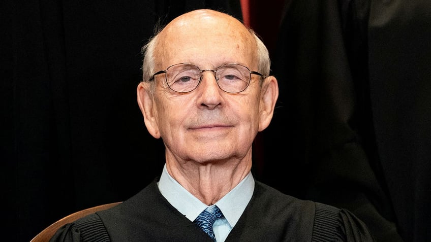 JUSTICE BREYER SMILES