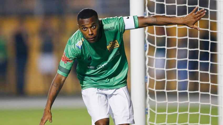 former soccer star robinho turns himself in to start serving 9 year prison sentence for rape