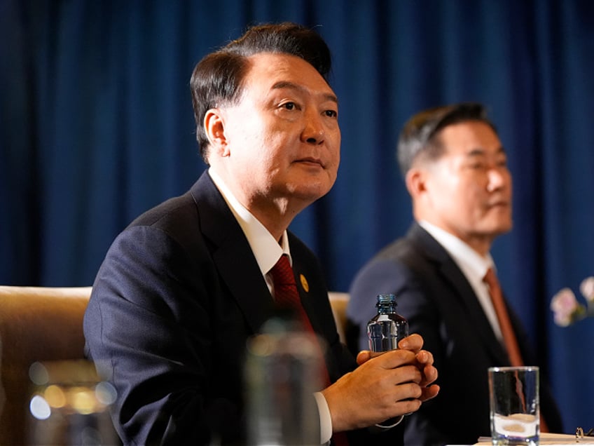 FILE - President of South Korea Yoon Suk Yeol, left, and National Security Director Shin Wonsik, right, listen during a trilateral meeting with President Joe Biden and the Prime Minister of Japan Shigeru Ishiba in Lima, Peru, Friday, Nov. 15, 2024. (AP Photo/Manuel Balce Ceneta, File)