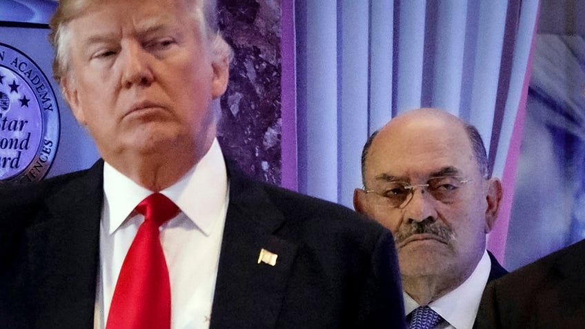 Weisselberg stands behinf Trump at Trump Tower news conference 