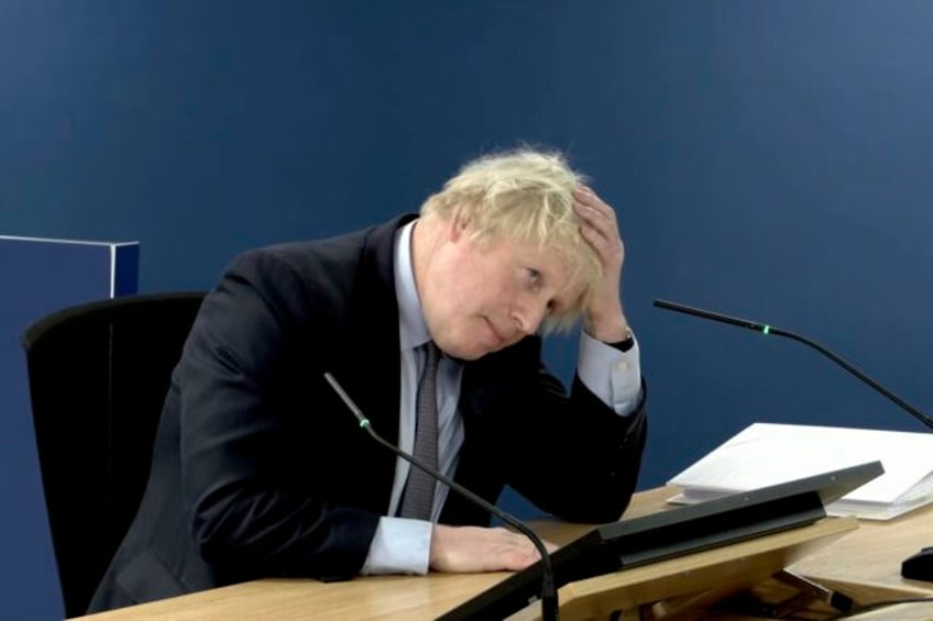 former uk prime minister boris johnson admits to making mistakes but defends covid record at inquiry