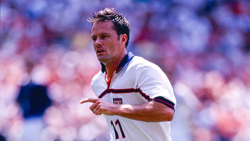 Eric Wynalda runs on soccer pitch