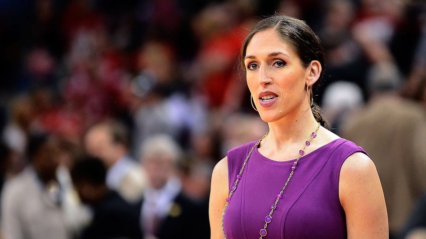 Rebecca Lobo looks on before a game