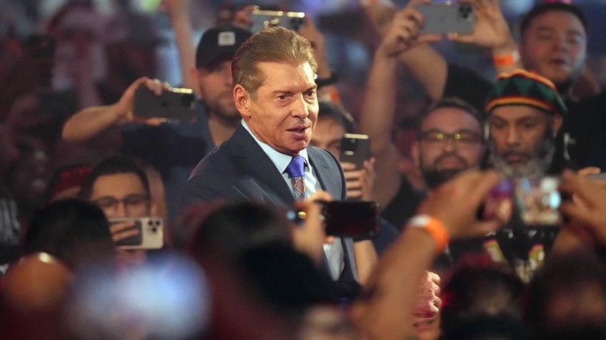 Vince McMahon inside an arena 