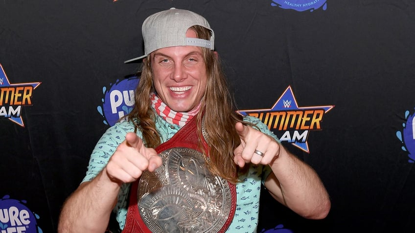 Matt Riddle poses with belt