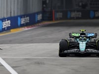 Formula 1 practice race suspended after large lizard invades the track ahead of Singapore Grand Prix