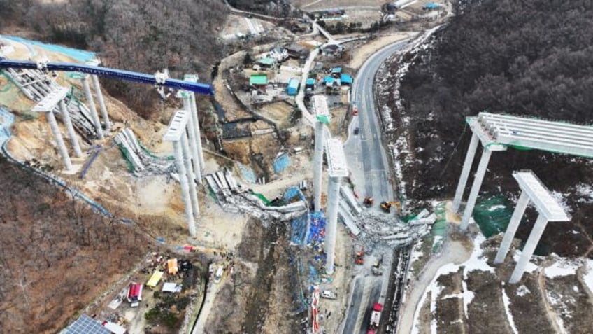 Four people were killed and six injured in South Korea when a section of a bridge under co
