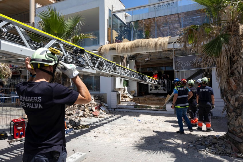 four killed as spanish holiday magnet beach club collapses