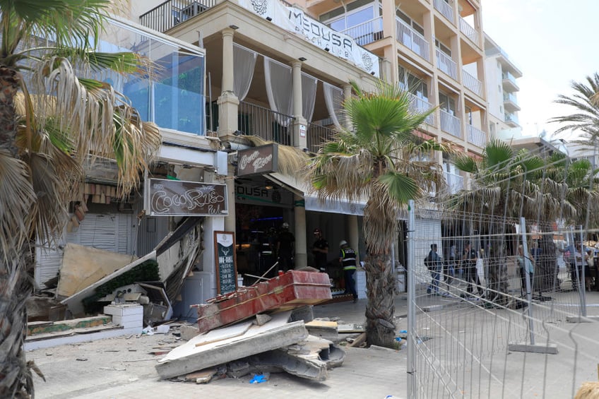 four killed as spanish holiday magnet beach club collapses