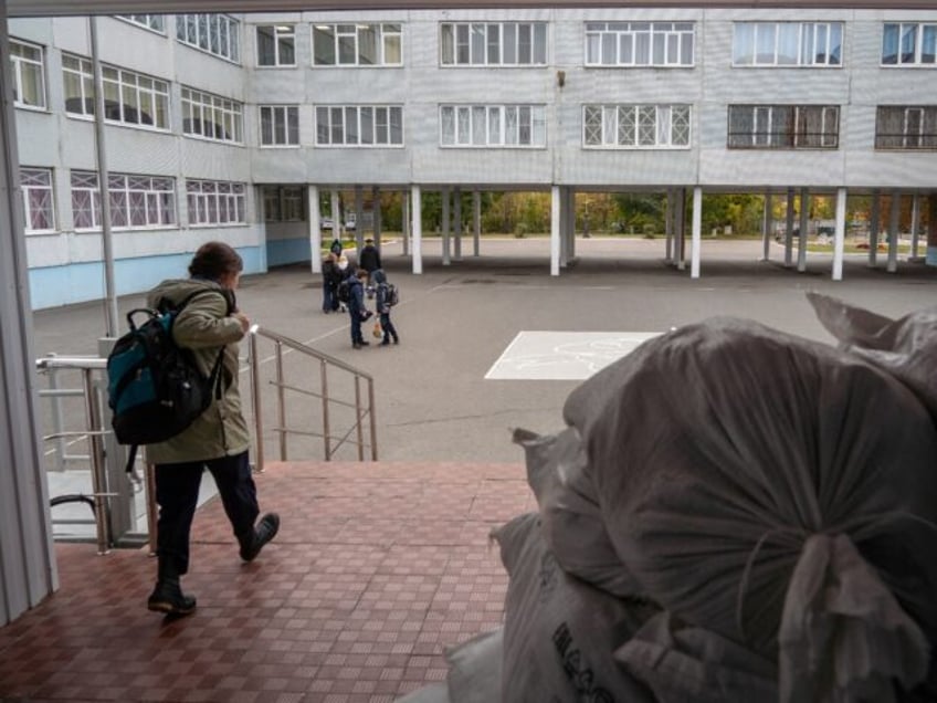 Sandbags fortify the entrance to a school building in Kursk on October 17, 2024, amid the