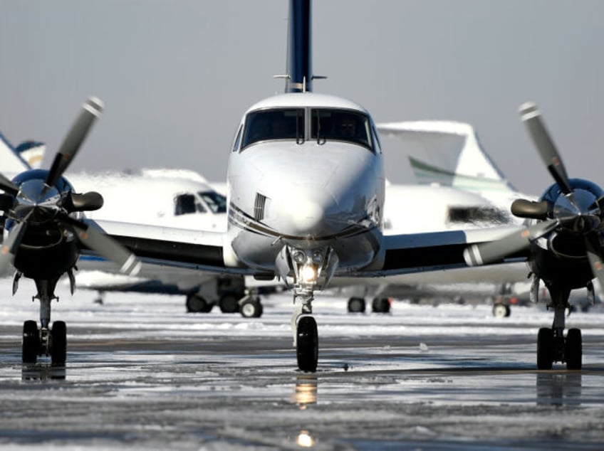 CENTENNIAL, CO - FEBRUARY 21: A Beechcraft King Air taxing to the runway for takeoff at th