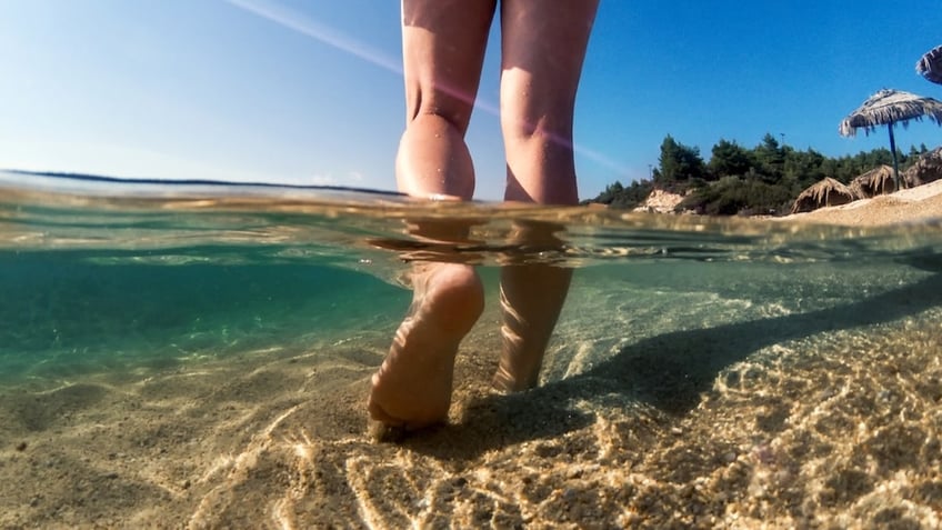 Wading in ocean