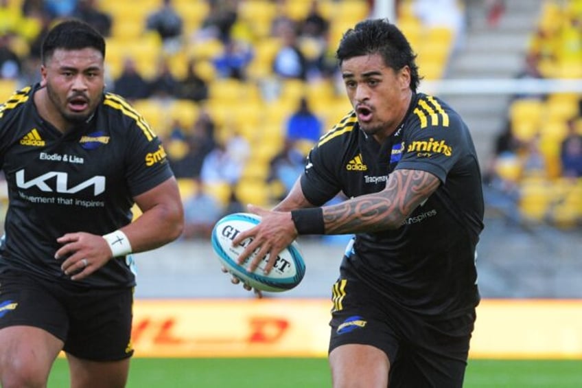 Bailyn Sullivan (right) scored four tries for Wellington Hurricanes after coming off the b
