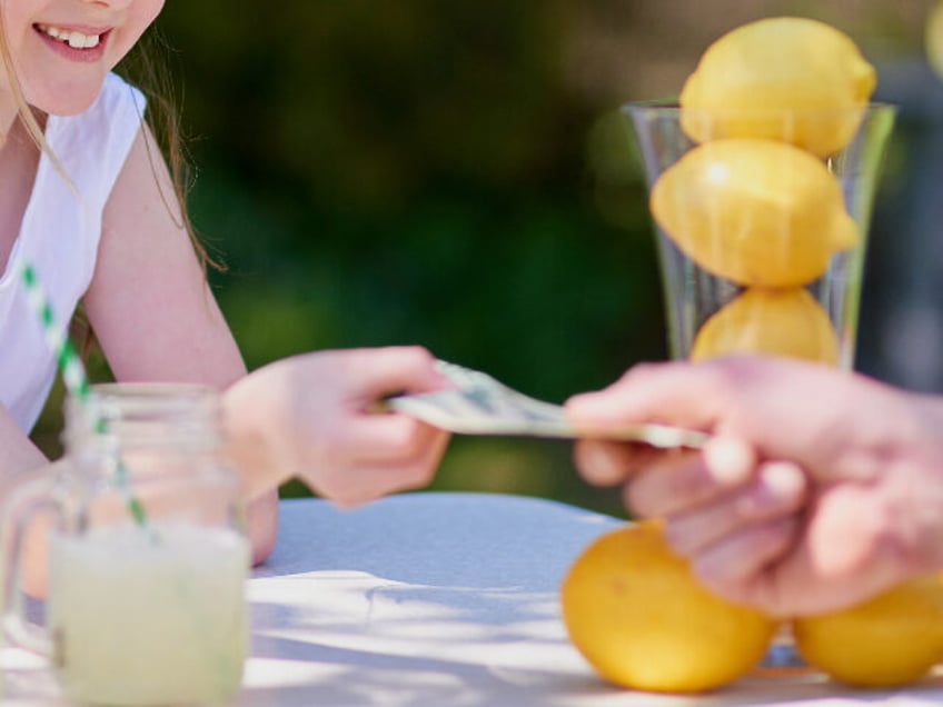 four year old donates lemonade stand profits to charity