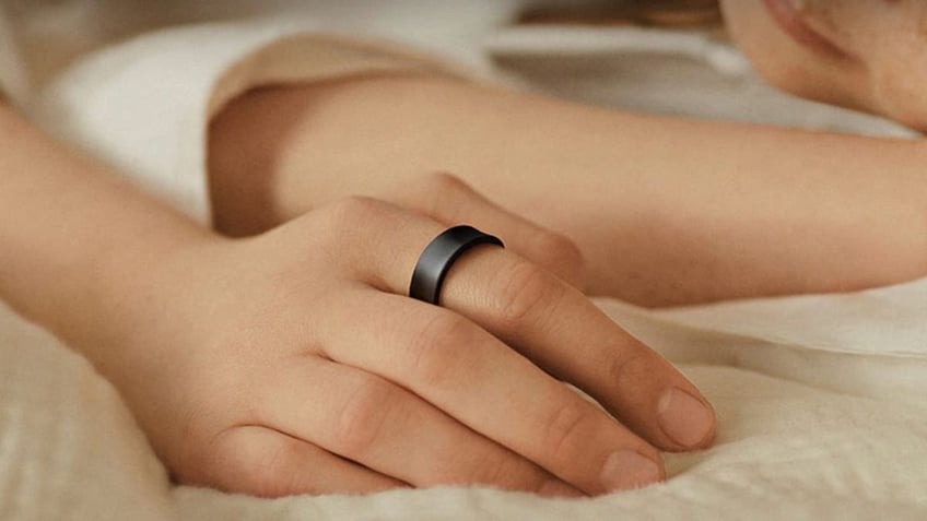 A woman wearing a smart ring 