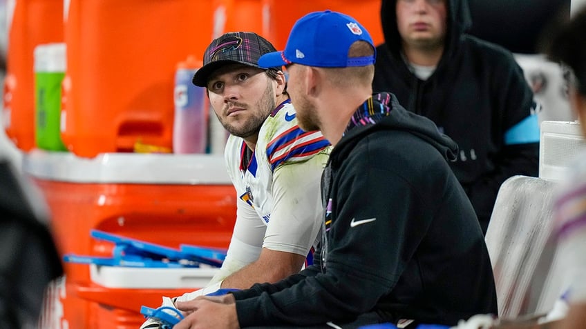 Josh Allen looks on