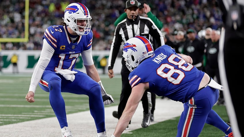 Josh Allen celebrates with Dawson Knox