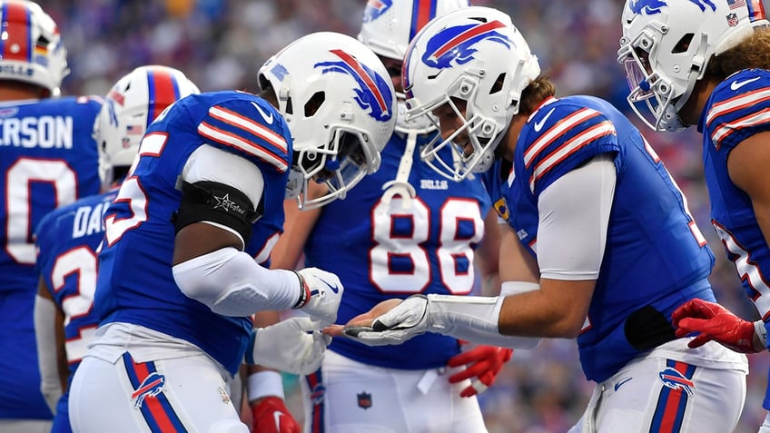 Quintin Morris and Josh Allen celebrate