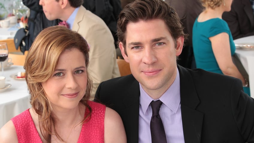 Jenna Fischer as Pam Beesly Halpert, John Krasinski as Jim Halpert