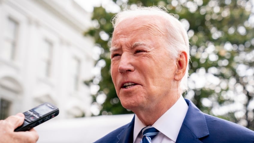 President Joe Biden speaking with reporters