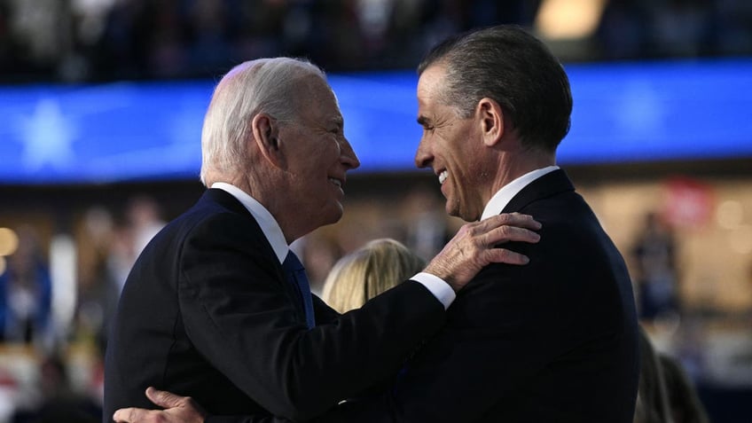 President Biden, left, embracing son Hunter at DNC