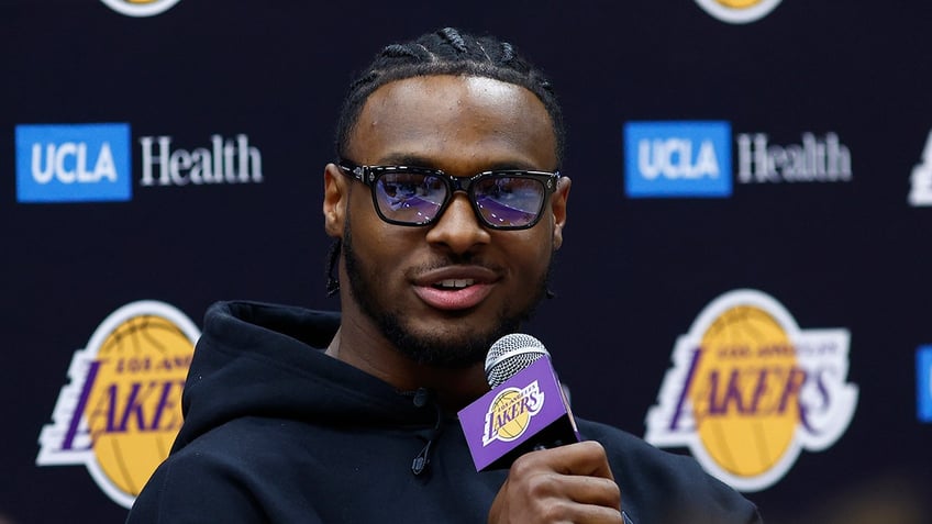 Bronny James with media