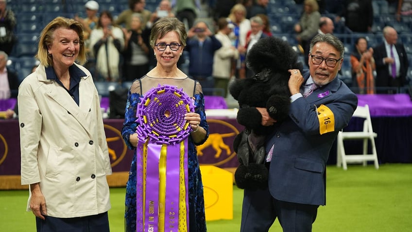 Judge poses with dog