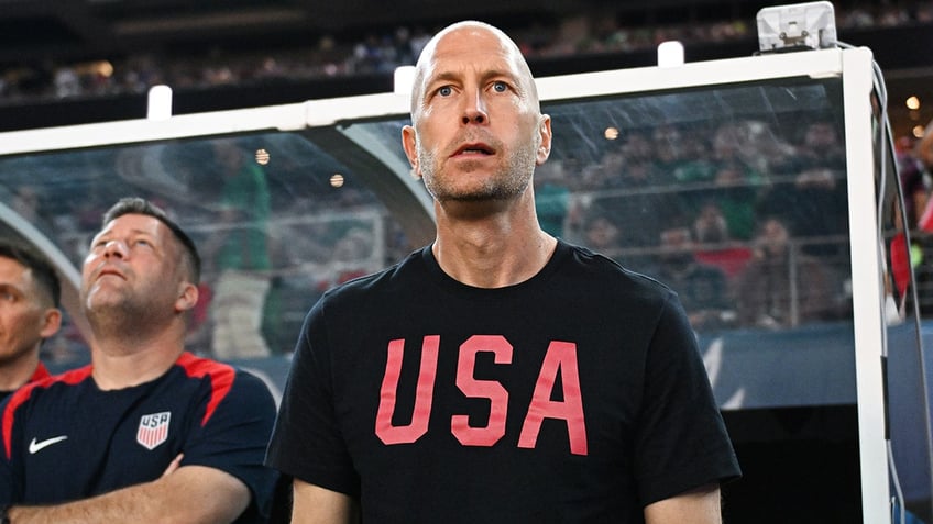 Gregg Berhalter looks on pitch