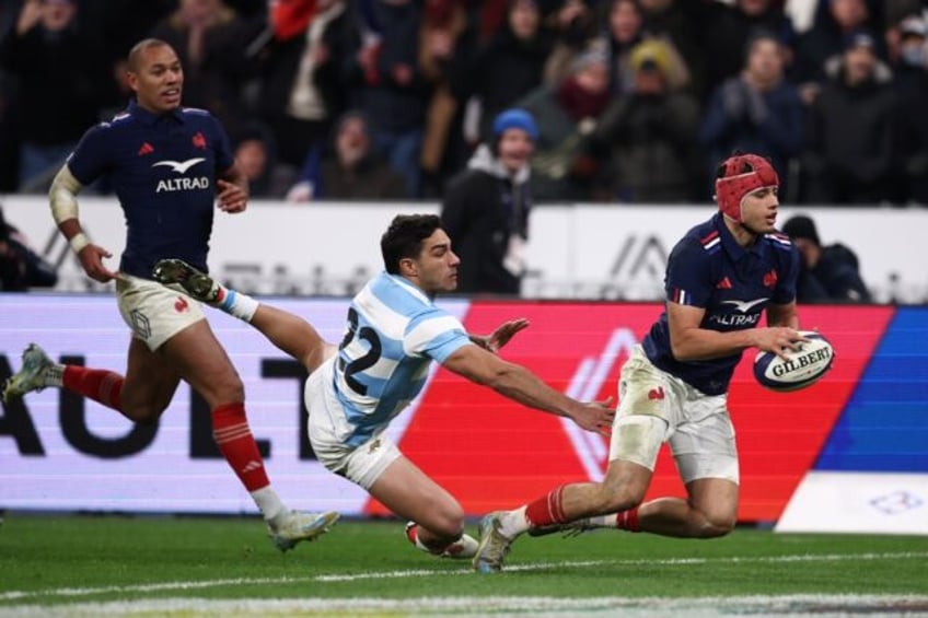 Louis Bielle-Biarrey (R) scored the pick of France's tries