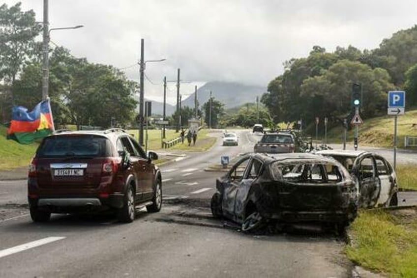 france declares state of emergency sends troops to quell deadly riots in pacific territory