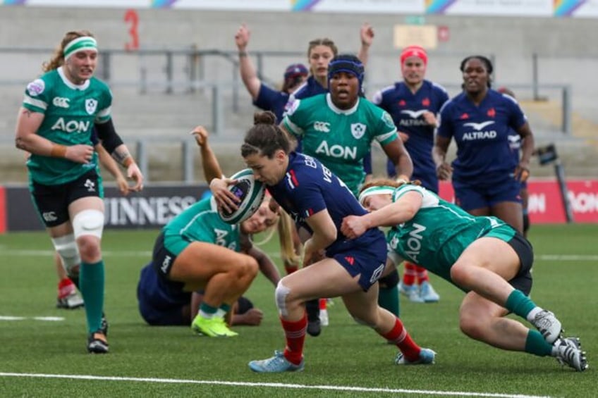 Mixed match: France centre Gabrielle Vernier crosses to score the opening try but was late